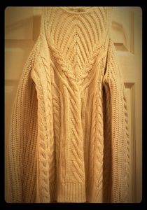 Peek-a-boo sleeve sweater